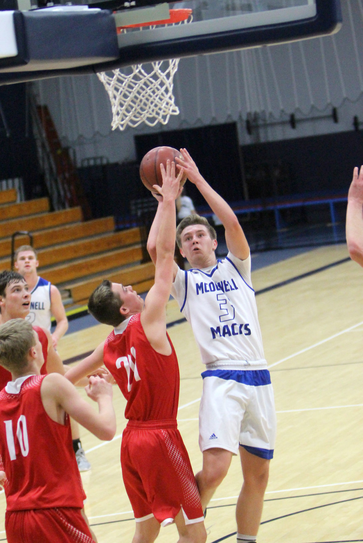 McDonell boys basketball vs Colfax at UW-Stout 12-1-18